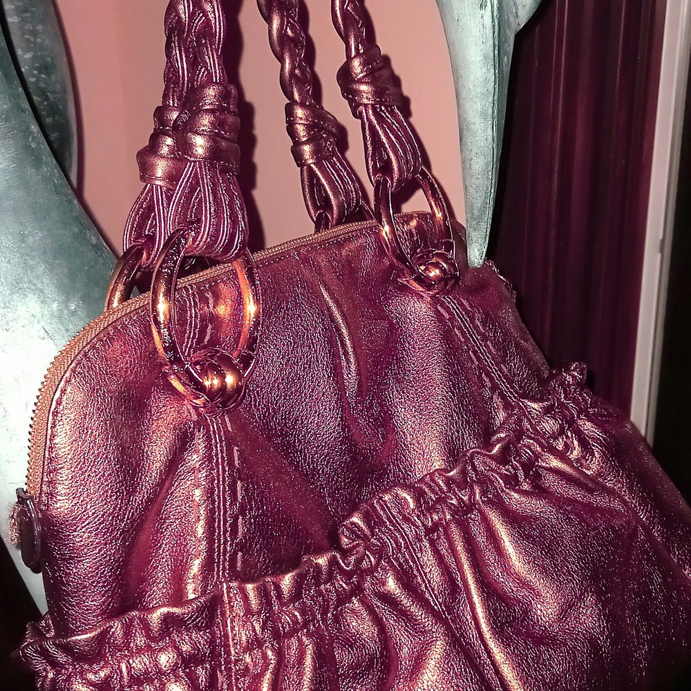 Bronze Shoulder Bag with Slouchy Design and Braided Straps.     B makowsky